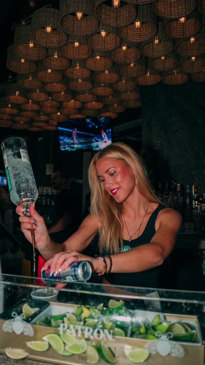 Bartender pouring drinks at Cantina Añejo